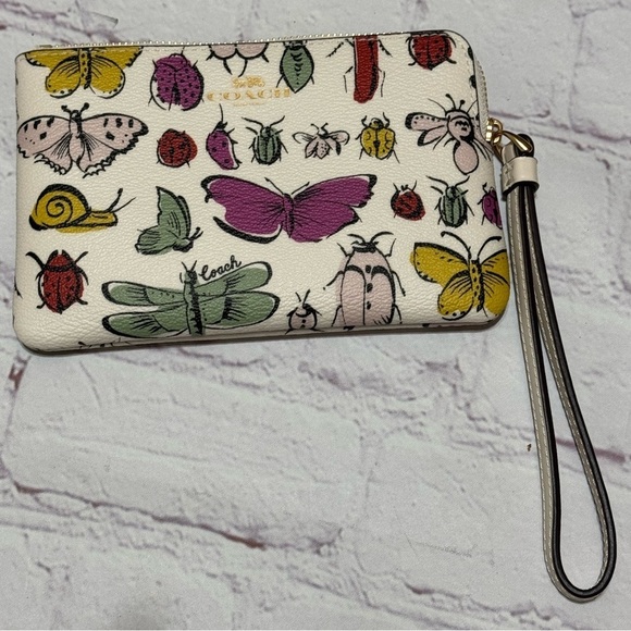 COACH Corner Zip Wristlet Signature Canvas With butterflies & critters Print NWT - Picture 9 of 9